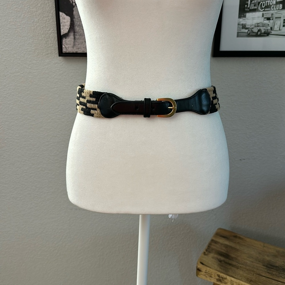 Tan and black belt. Faux leather. Great statement piece. Small